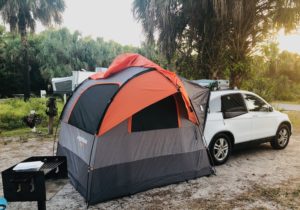 small suv camper with hatchback tent