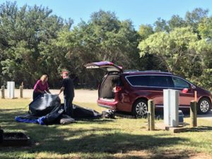 Putting up the minivan tent for camping