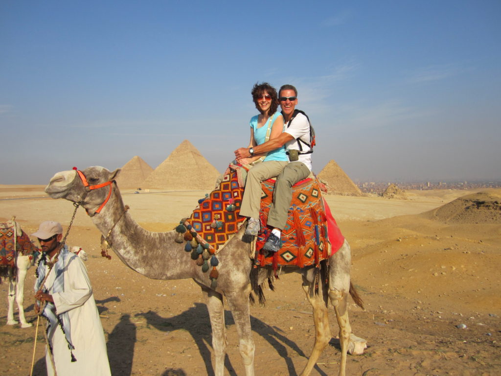 Owen and Lauren Mitchell riding a camel